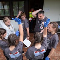 Ein Team motiviert sich vor der nächsten bewerbsstation